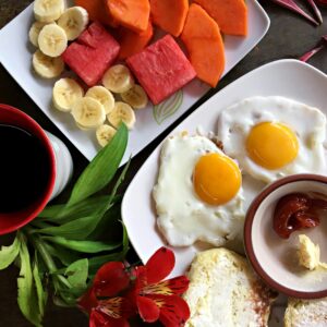 Delicious Garden Breakfast with Eggs, Toasts and Fruit